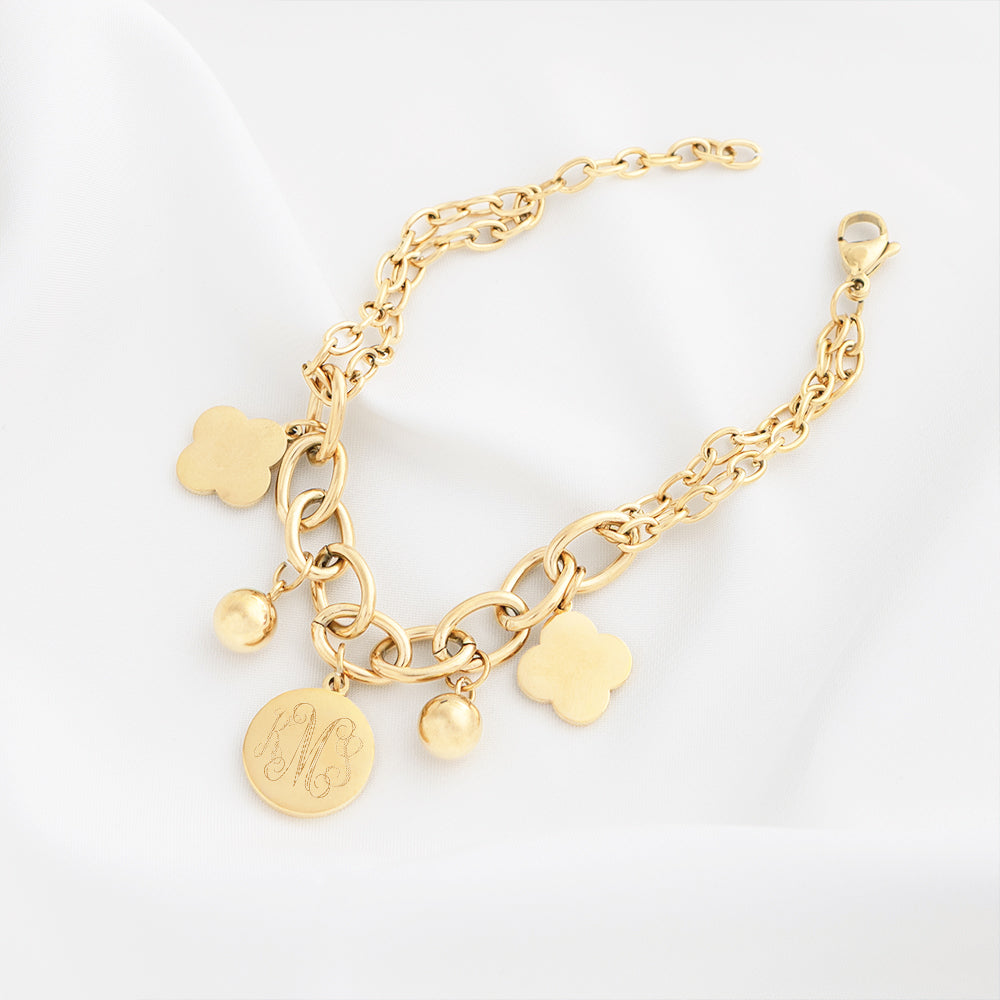 Monogrammed Clover charm Bracelet on white silk