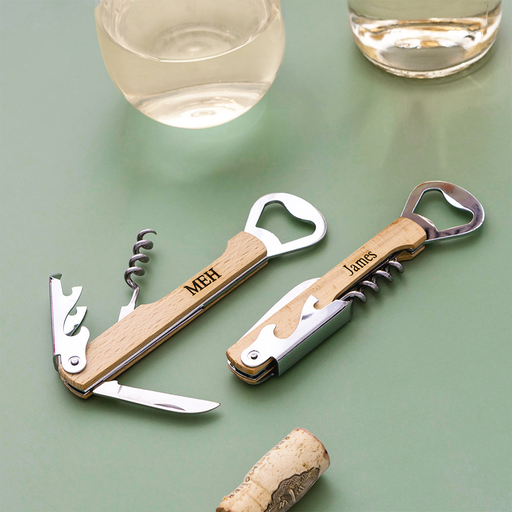 duo wine bottle openers on green background