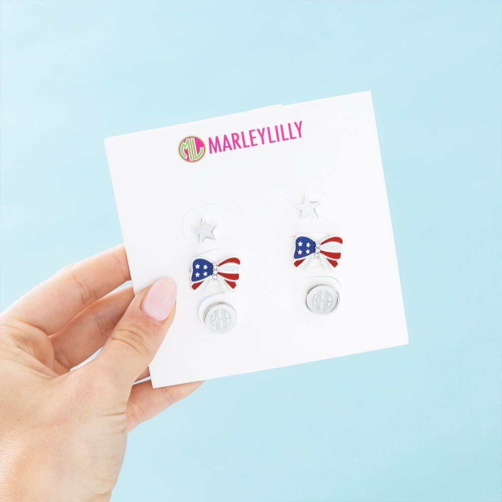 silver patriotic earring set in hand