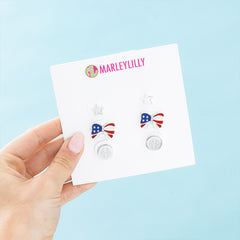 silver patriotic earring set in hand
