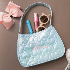 quilted shoulder bag flatlay