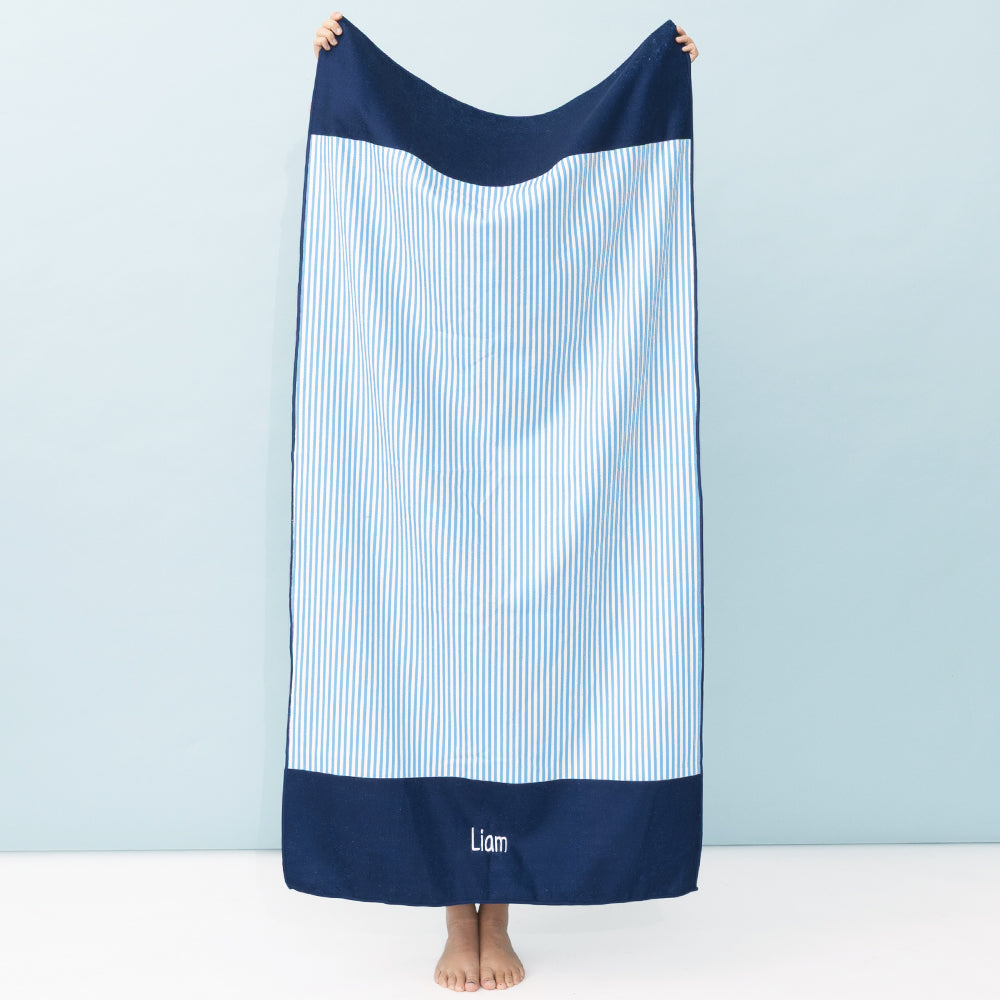 personalized kids beach towel in blue mini stripes