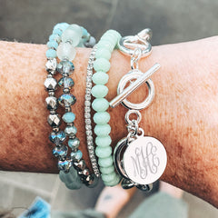 silver monogrammed link lock disc bracelet stack