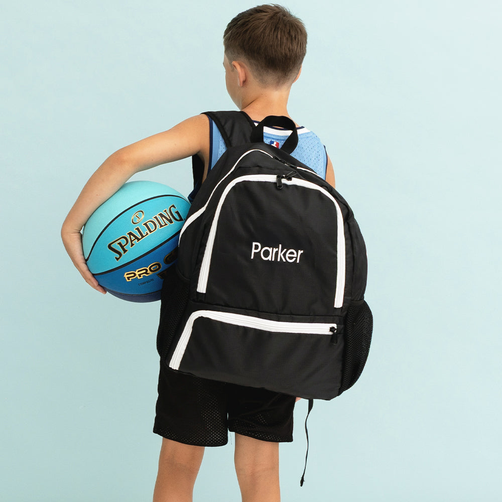 kids black activity backpack on back