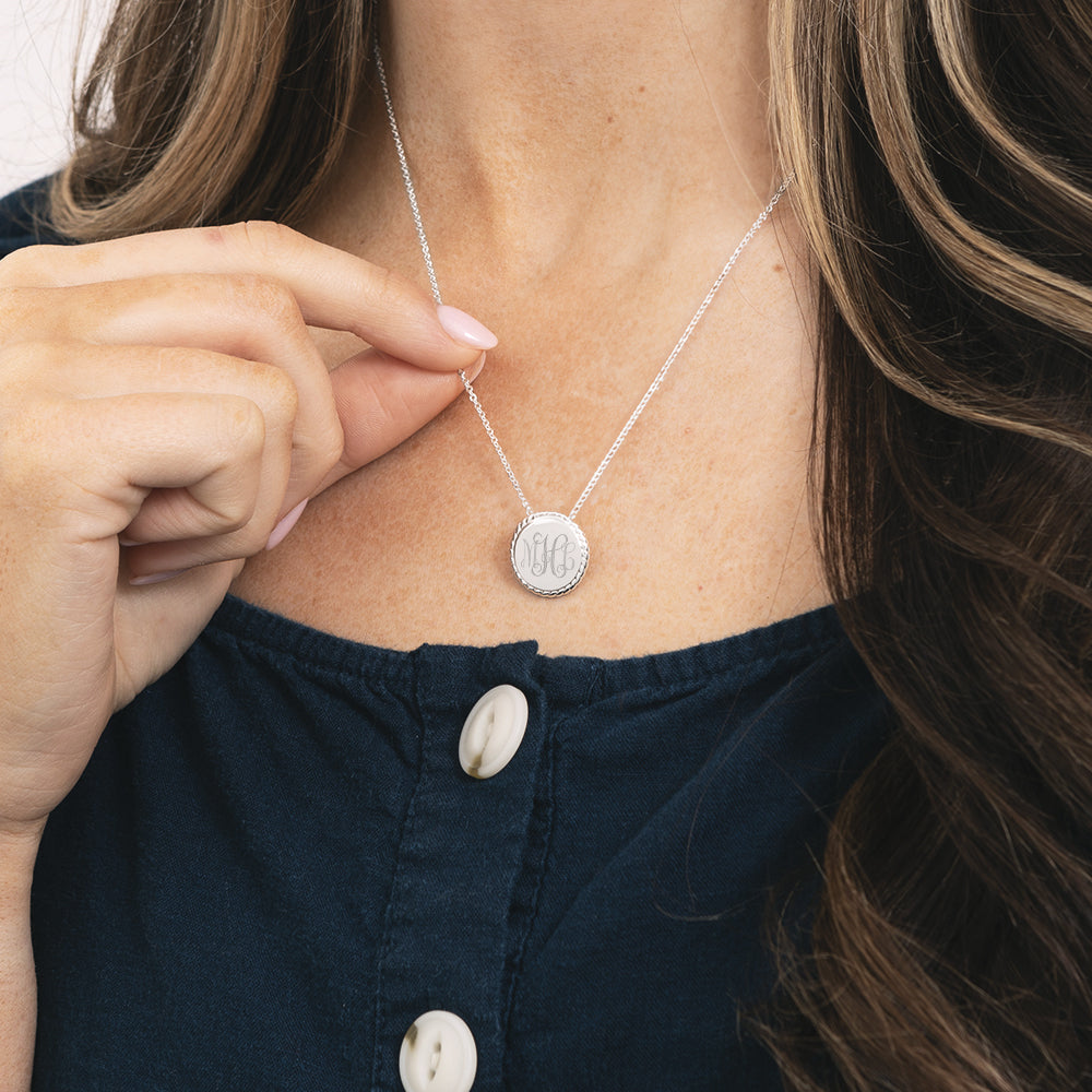 girl wearing nala monogrammed necklace