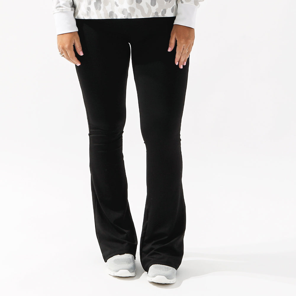 black crossover flare leggings front view