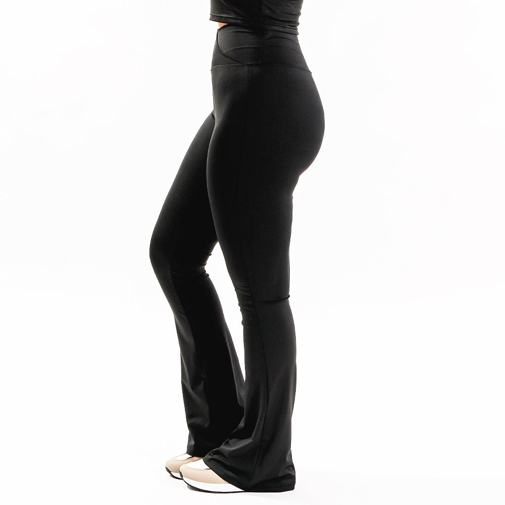 black crossover flare leggings side view