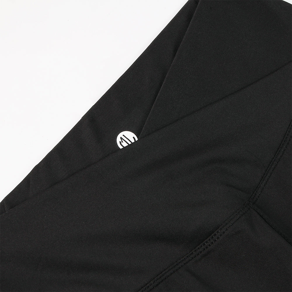 black crossover flare leggings up close