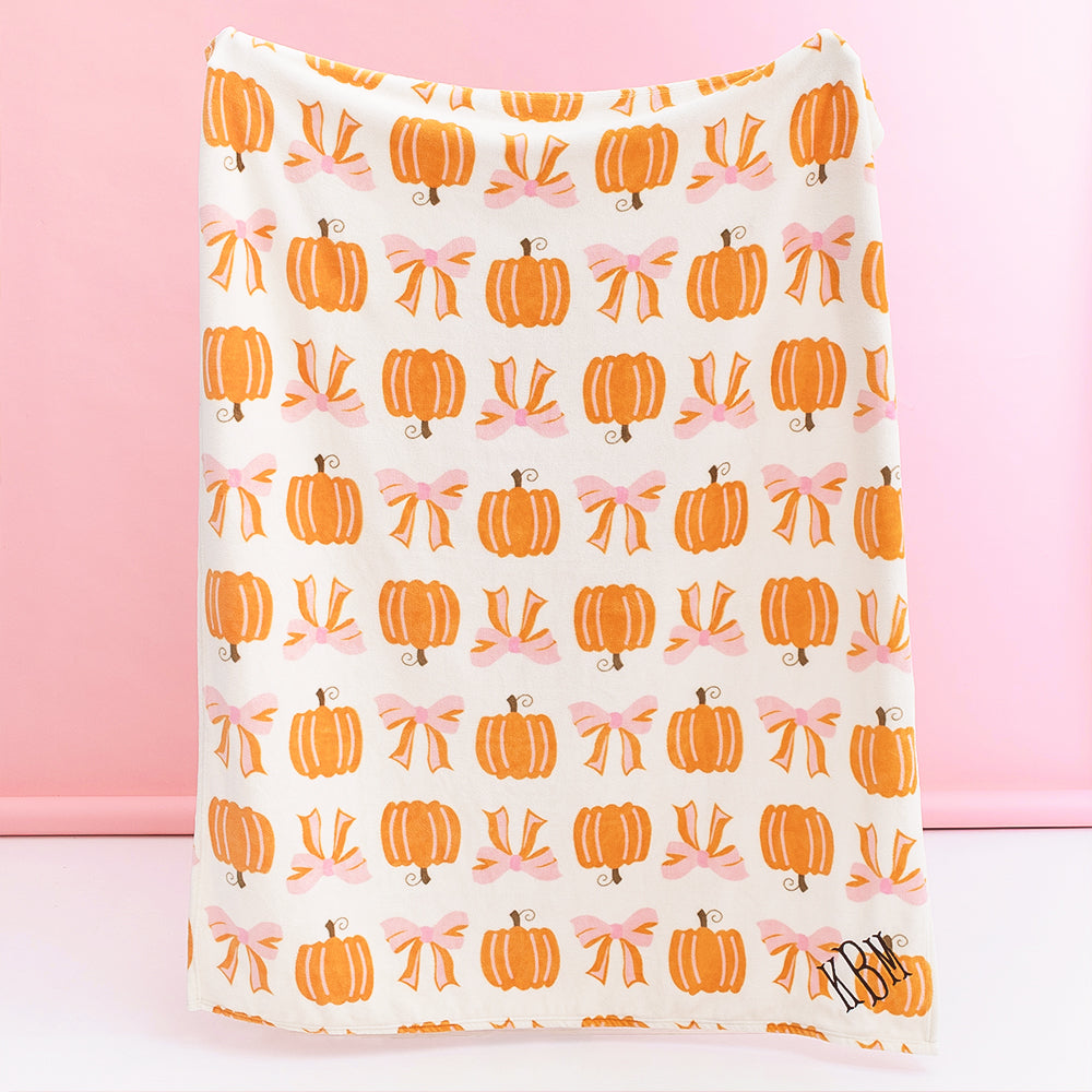 Posh Pumpkin personalized plush blanket held up