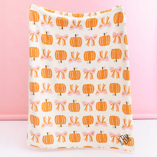 Posh Pumpkin personalized plush blanket held up
