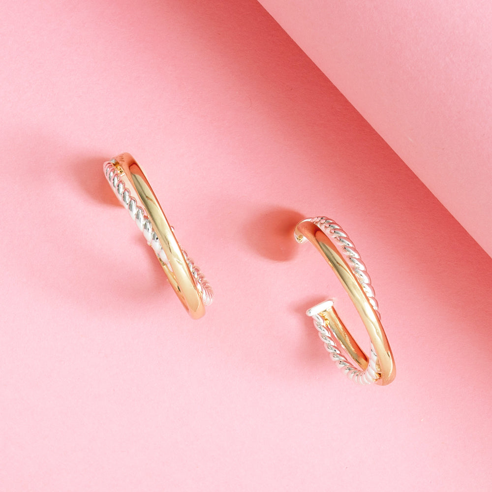 cable hoop earrings on pink background