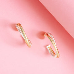 cable hoop earrings on pink background