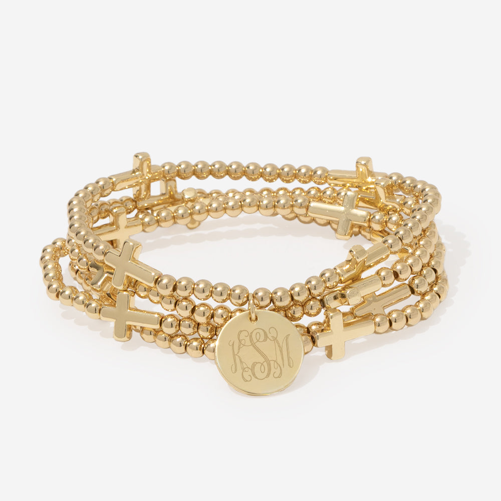 monogrammed cross bracelet stack in gold
