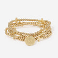 monogrammed cross bracelet stack in gold