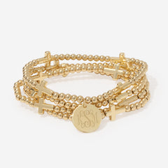 monogrammed cross bracelet stack in gold