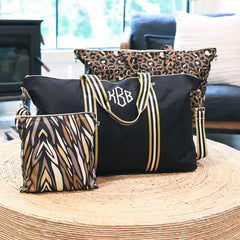 Personalized packing travel bag weekender set on table