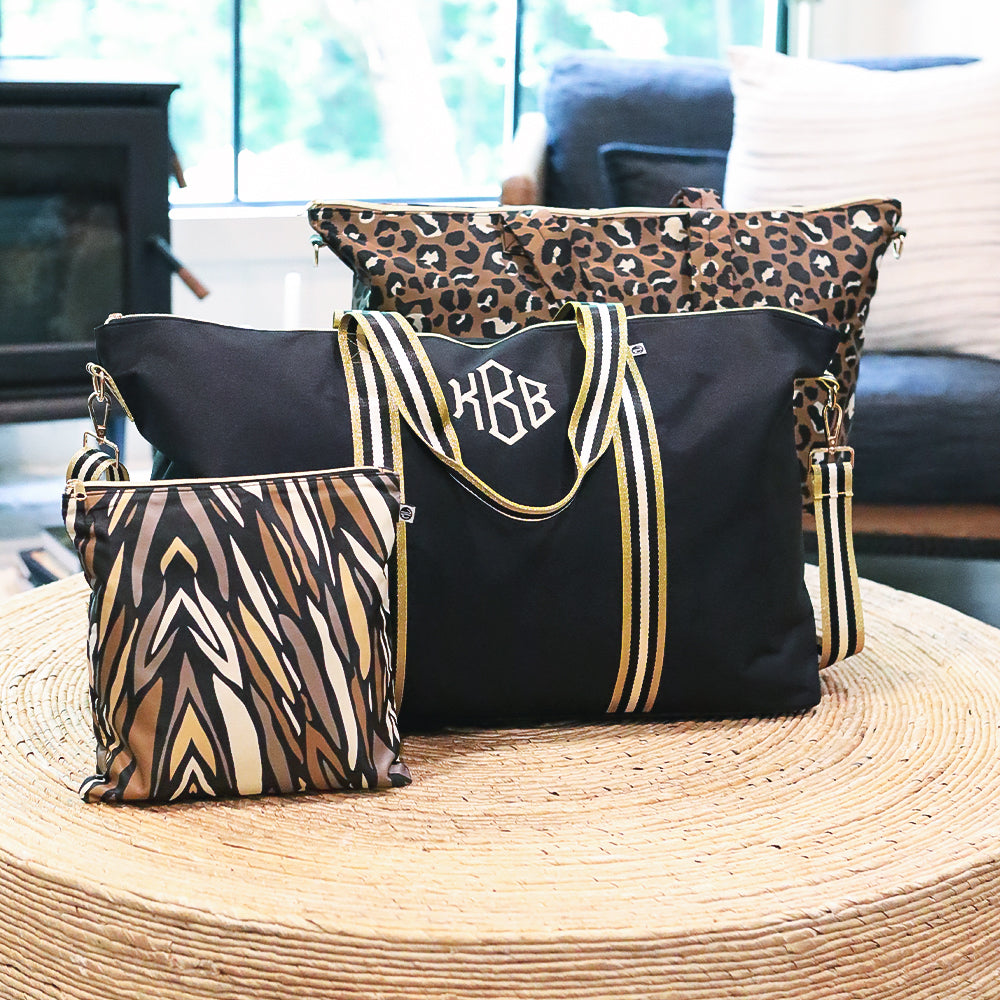 Personalized packing travel bag weekender set on table