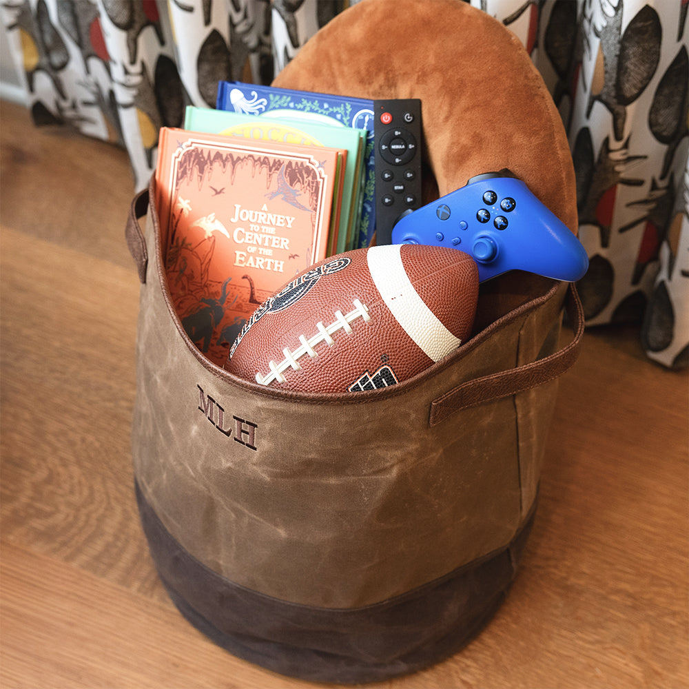 kids waxed canvas storage basket with toys and books