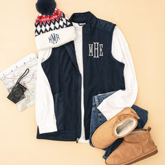 lightweight vest in navy with beanie and boots