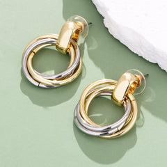 Round Mixed Metal Earrings on green