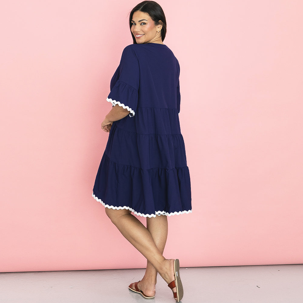 back of navy monogrammed ric rac dress