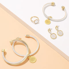 group shot of cable drop earrings, cable bracelets, and adjustable ring
