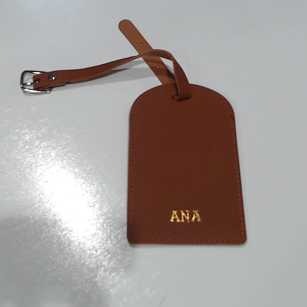 BLOOPER ACCESSORY: Monogrammed Passport Holders & Luggage Tags