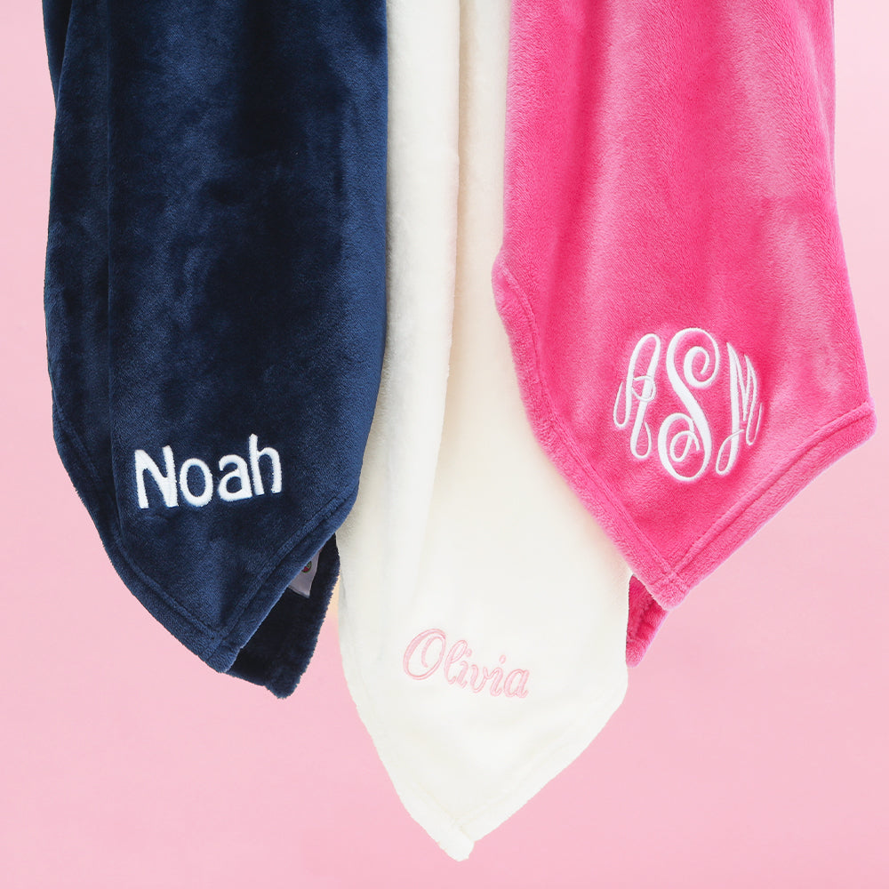 trio baby blankets in navy, ivory, and pink