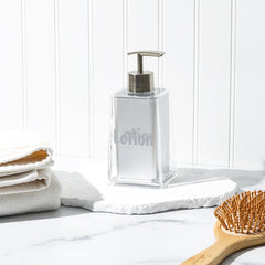 lotion dispenser with brush and towel