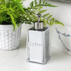 clear lotion dispenser with greenery