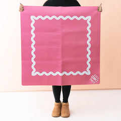 Girl holding up mahjong mat