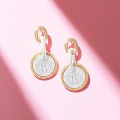 cable drop earrings on pink background