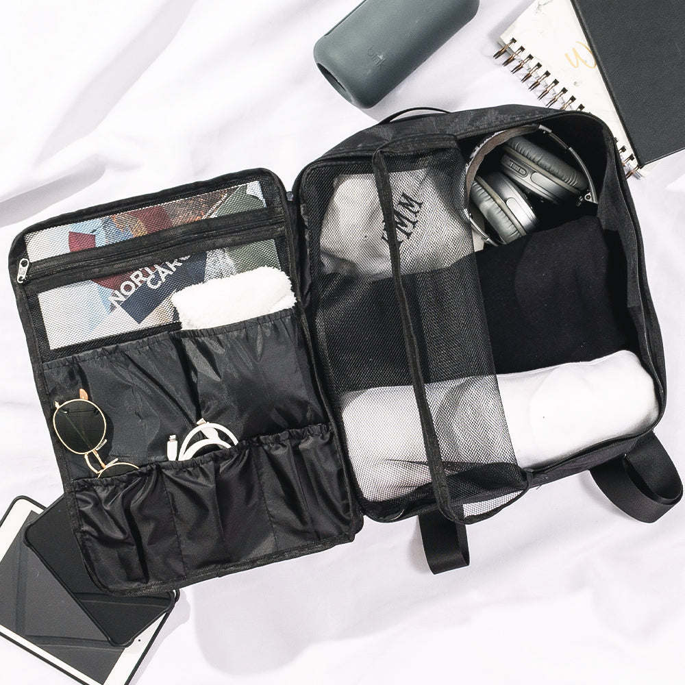 open shot of bag on black packable backpack