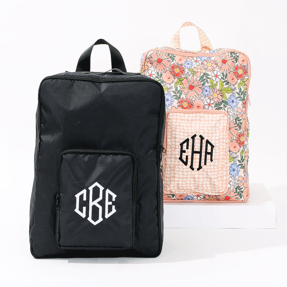 both colorways of monogrammed packable backpack