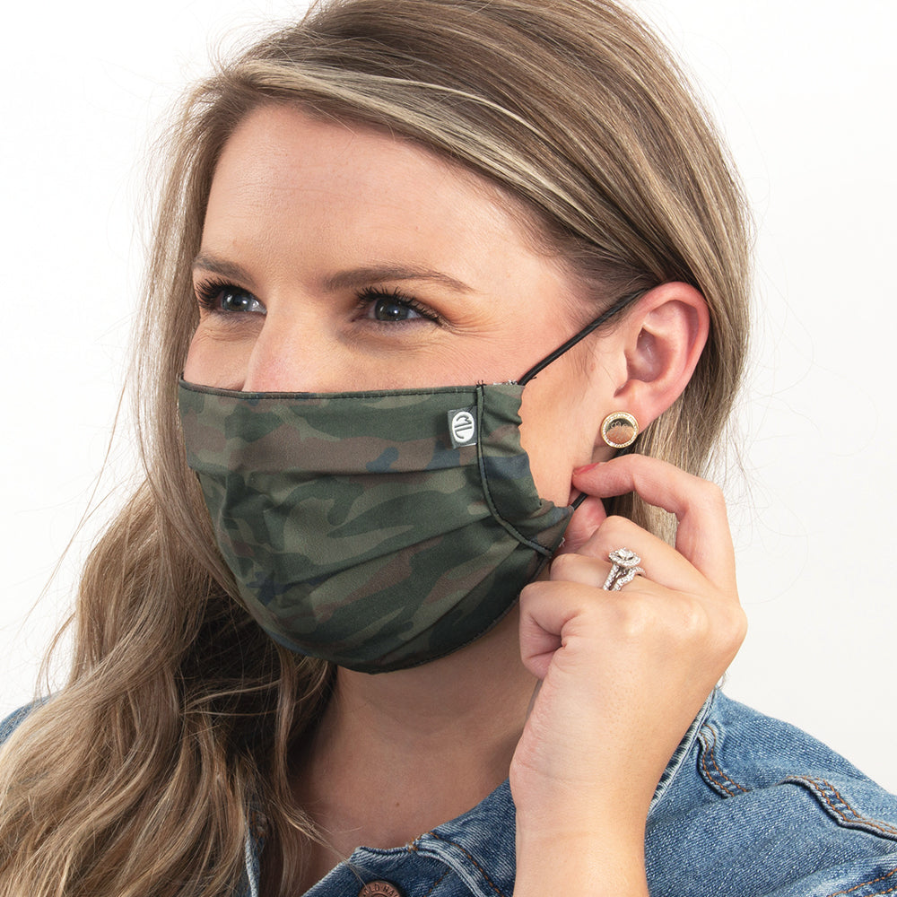 girl wearing camo face mask