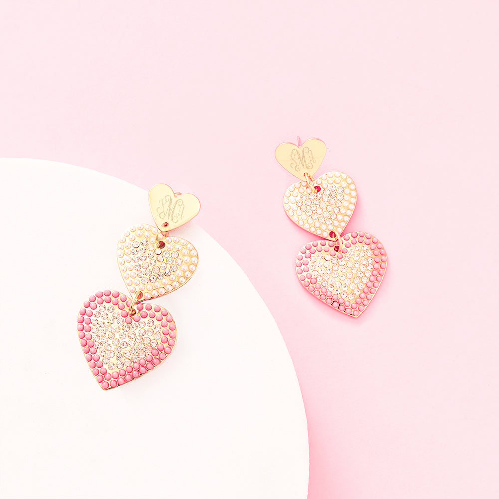pink heart earrings studio shot