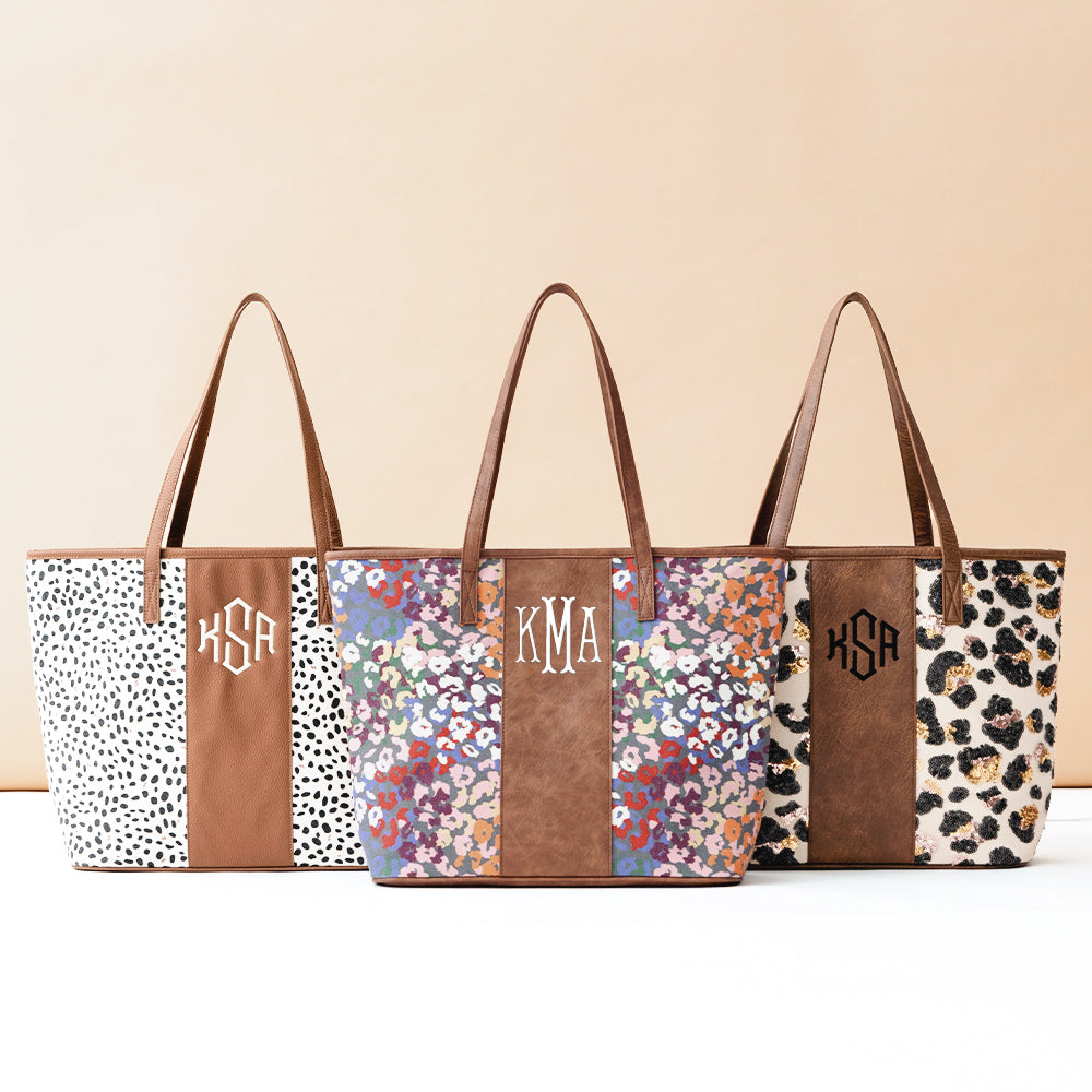 animal print travel tote bag Dina Zebra | Totes Exterior is made of Polyester and Cotton with faux leather accents Interior is made of Poly Twill lining Leopard Spots colorway has a faux hair feel Measures approximately 18 inches wide by 12 inches tall and 5 inches deep Approximately 9.5 Monogrammed Leopard Tote Bag |
