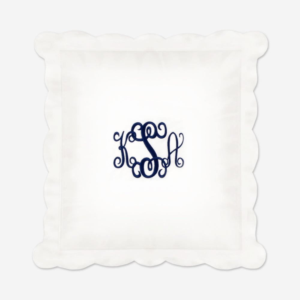 monogrammed scalloped pillow sham in white