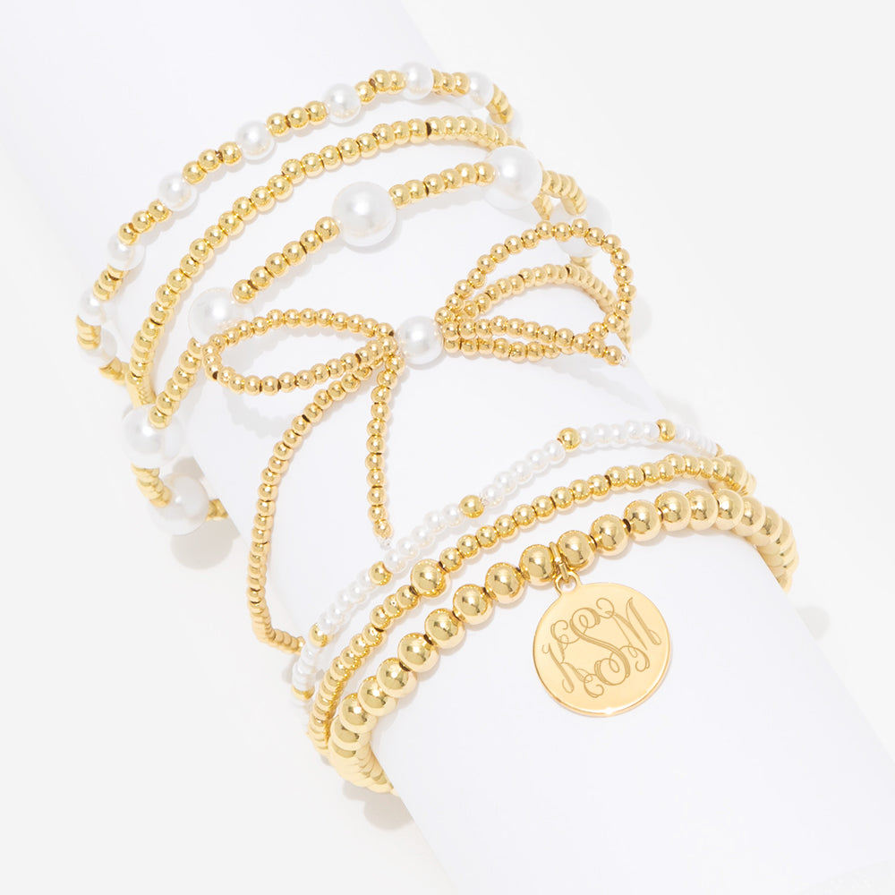 monogrammed pearl bow bracelet stack in gold