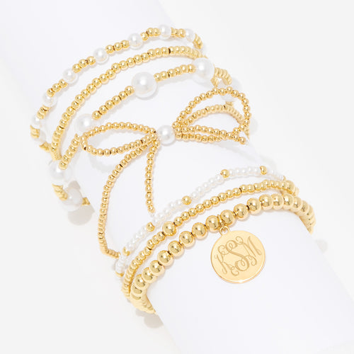 monogrammed pearl bow bracelet stack in gold