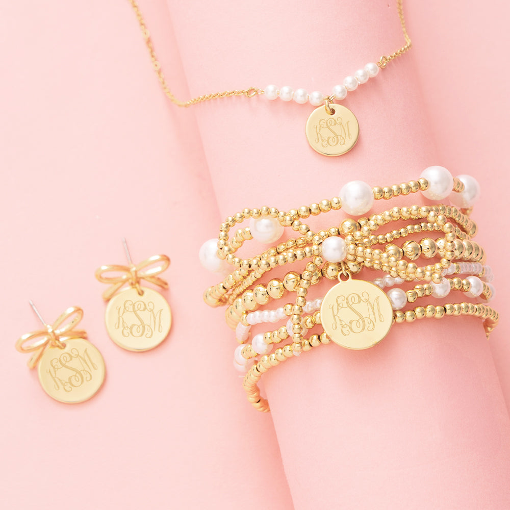 monogrammed pearl bow earrings and bracelet and pearl necklace