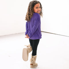 back of purple monogrammed softspun sweatshirt on girl