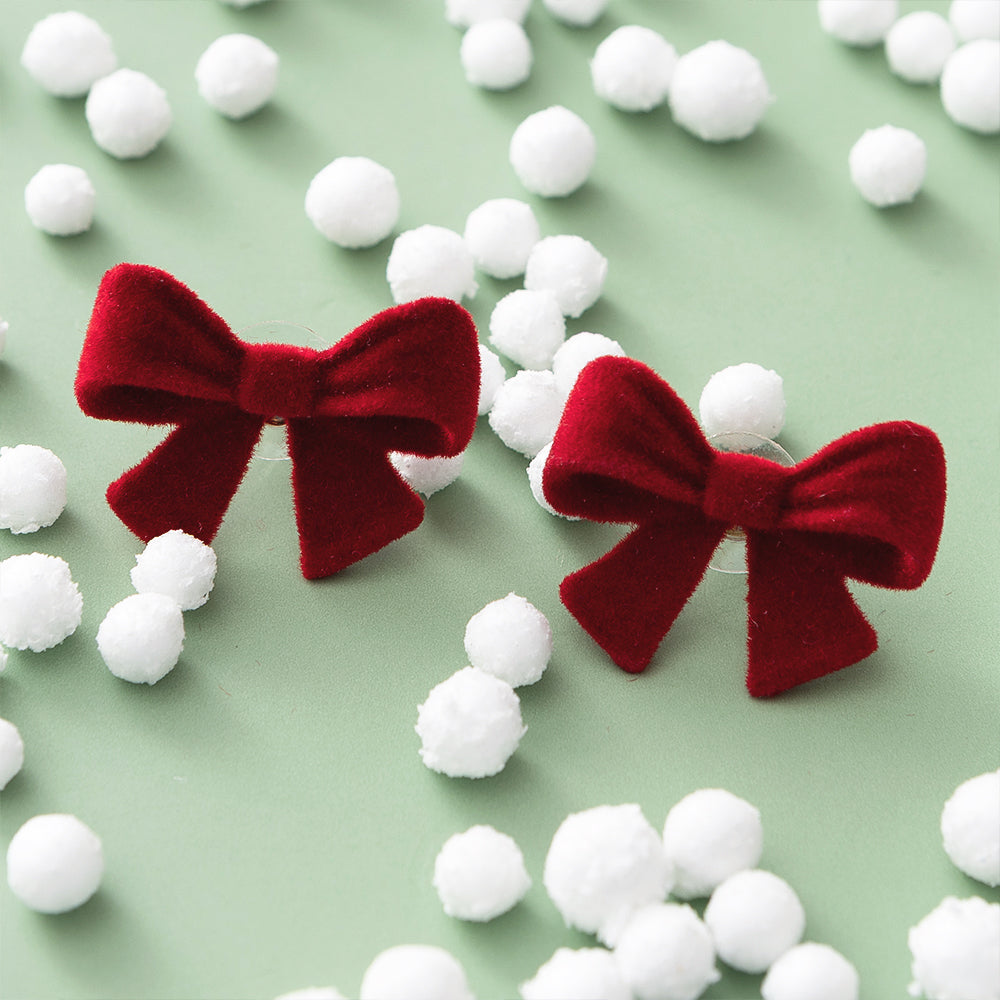 Velvet Bow Stud Earrings on green