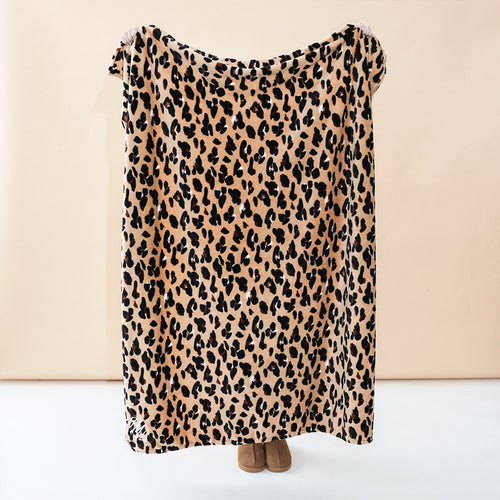 classic cheetah plush blanket in studio