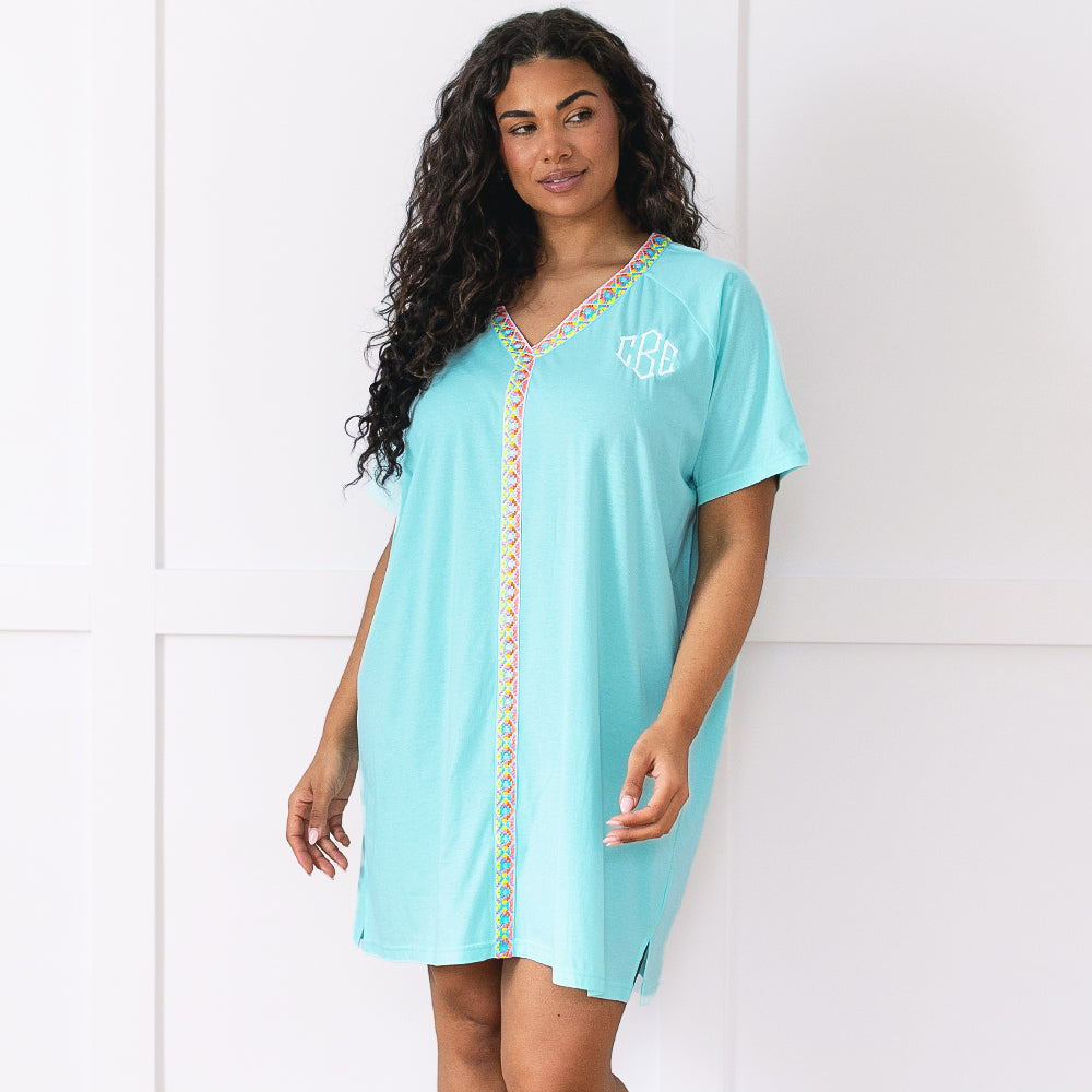 girl wearing ocean monogrammed accent cover up