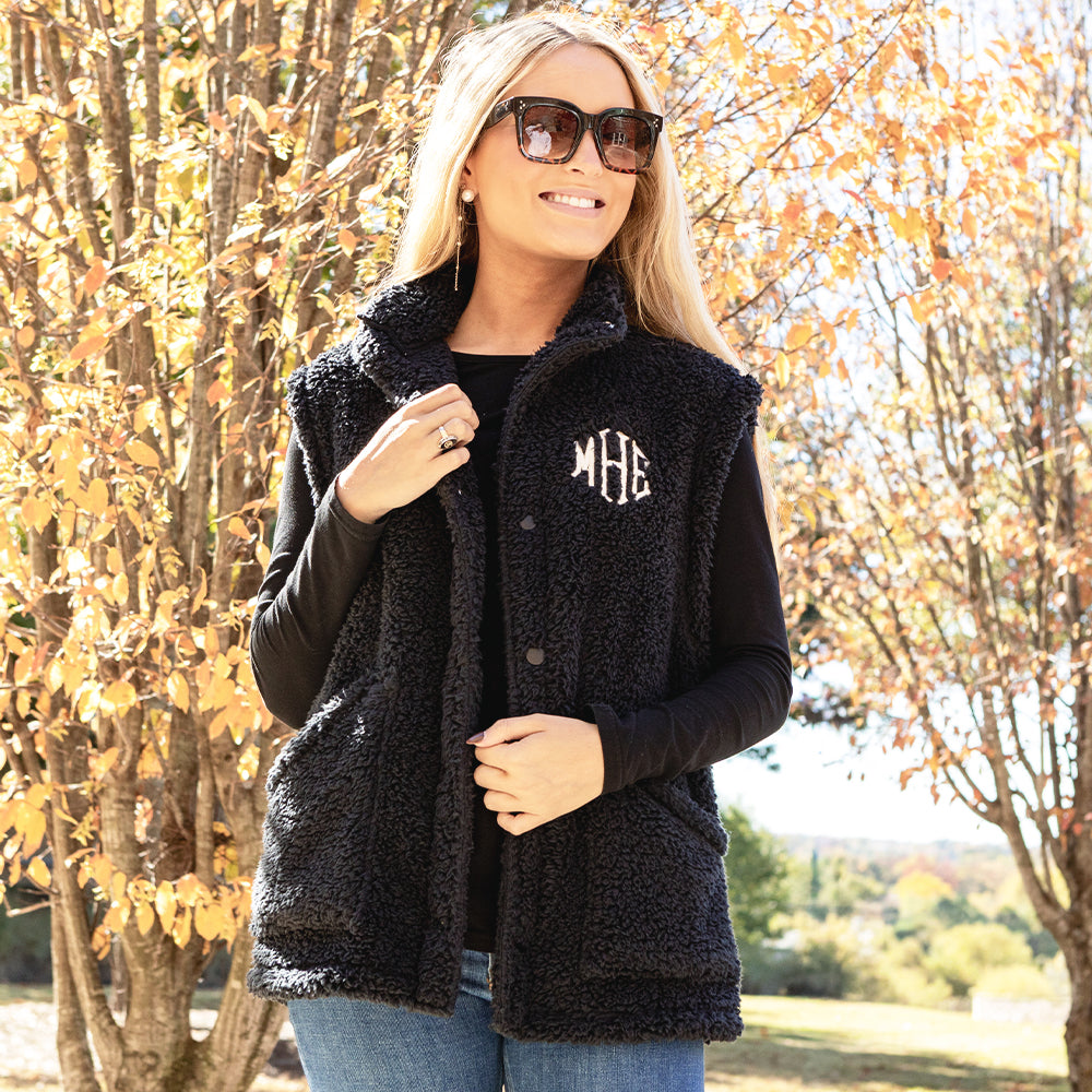 black oversized sherpa vest on bella