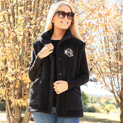 black oversized sherpa vest on bella