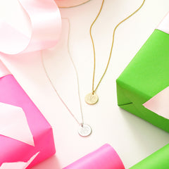 duo kids disc necklaces in gold and silver