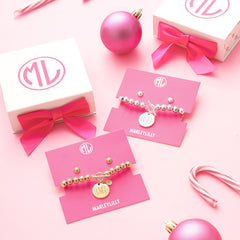 jewelry monogrammed set in silver and gold as christmas present