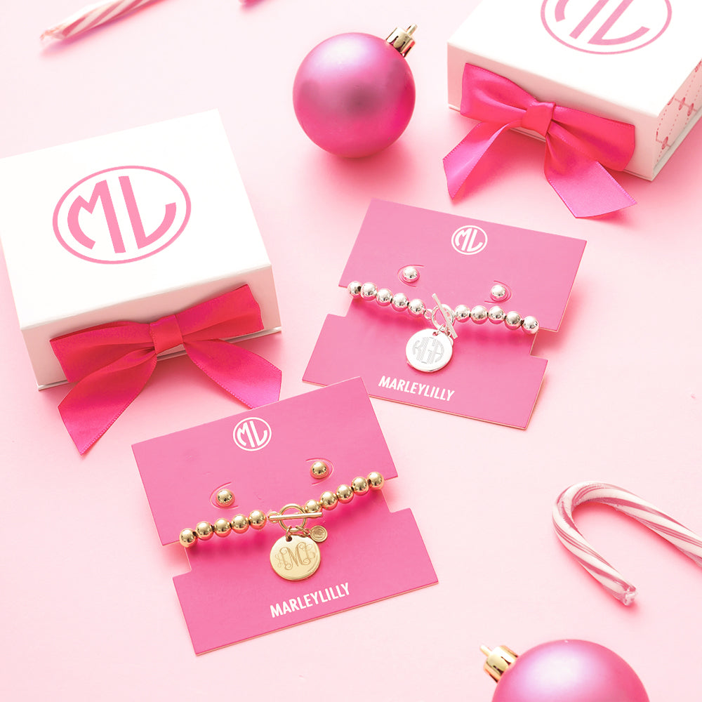 jewelry monogrammed set in silver and gold as christmas present